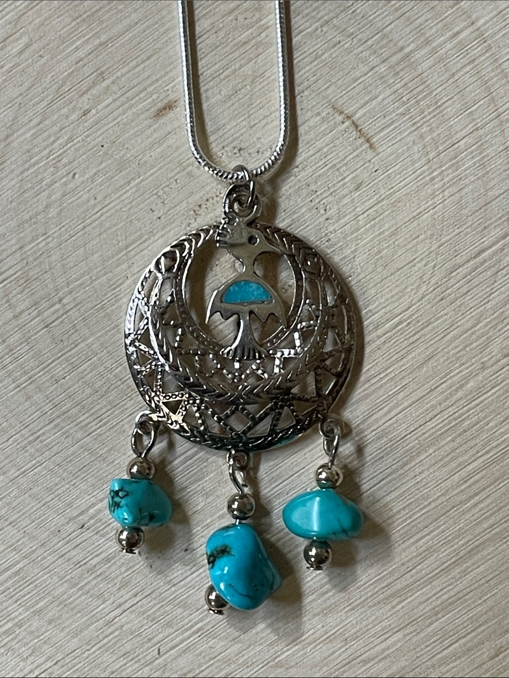 Sterling Silver Thunderbird Pendant Necklace with Turquoise